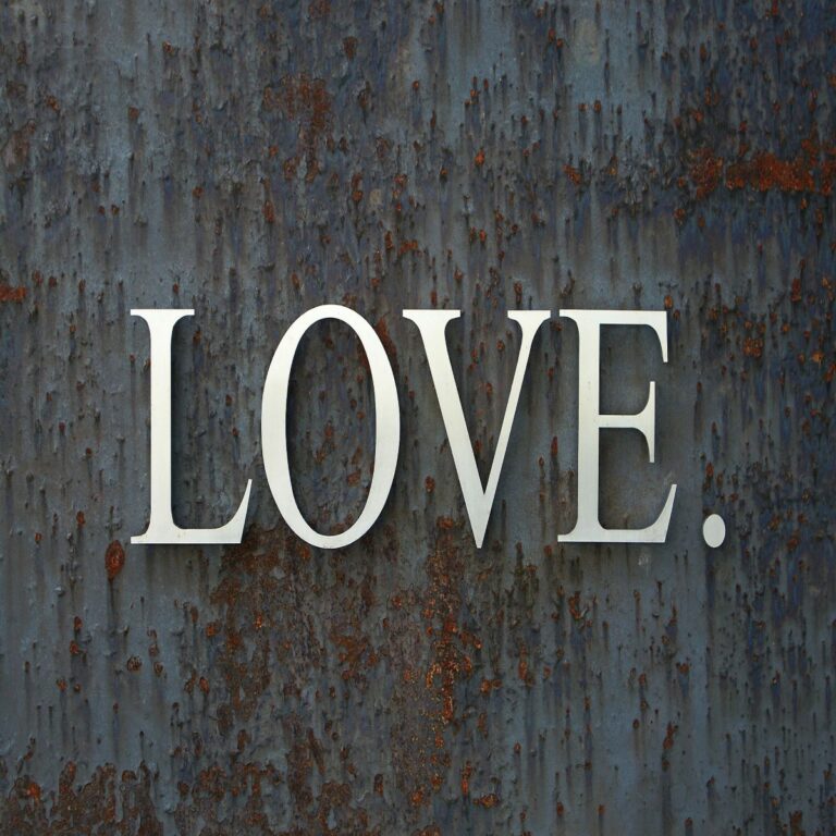 White letters on dark gray background