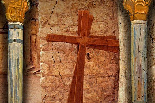 Cross on brick wall