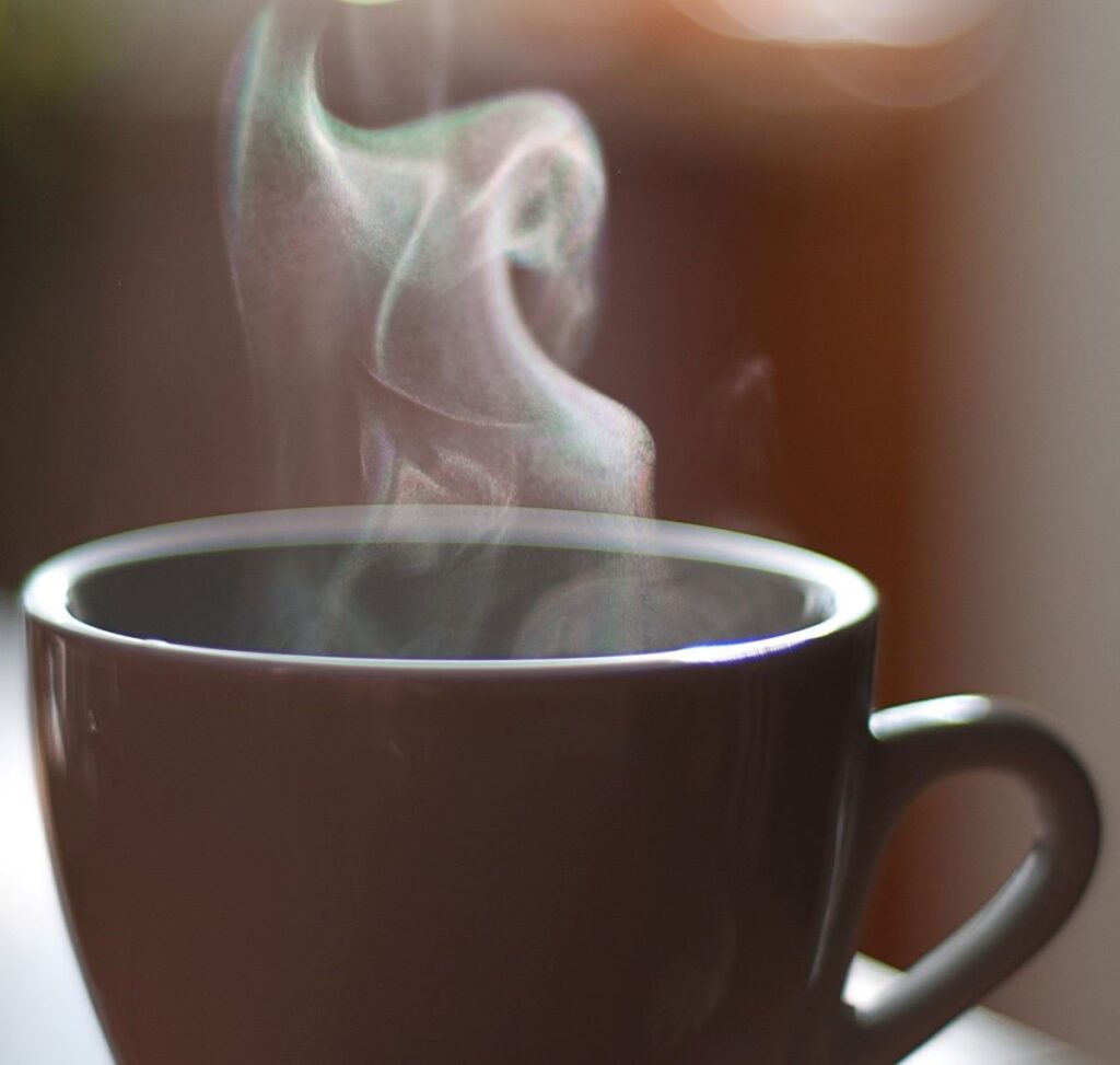 coffee cup showing steam rising