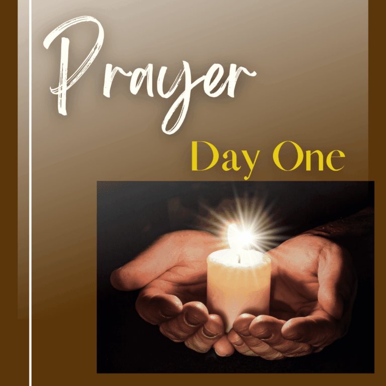 Hands with lit candle Prayer is written